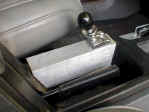 Passenger side view of the shifter and aluminum mounting shroud.