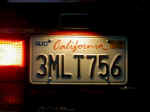 A night shot of the illuminated license plate.