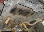 A view of the Jeep underside after tank removal